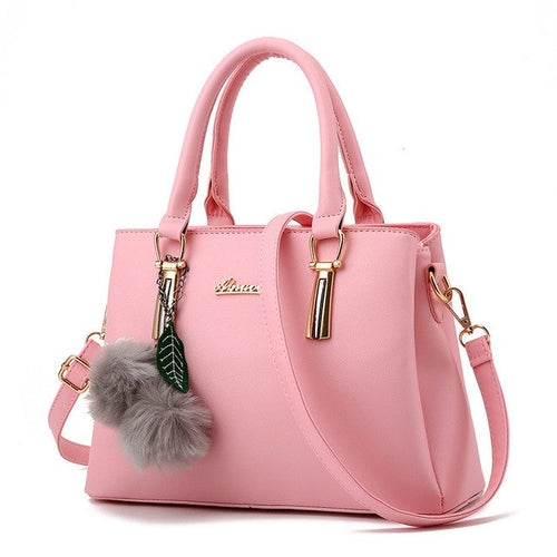 Designer Handbag with Ball Tassel
