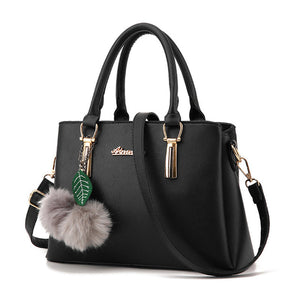 Designer Handbag with Ball Tassel