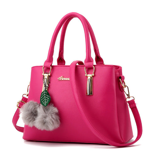 Designer Handbag with Ball Tassel